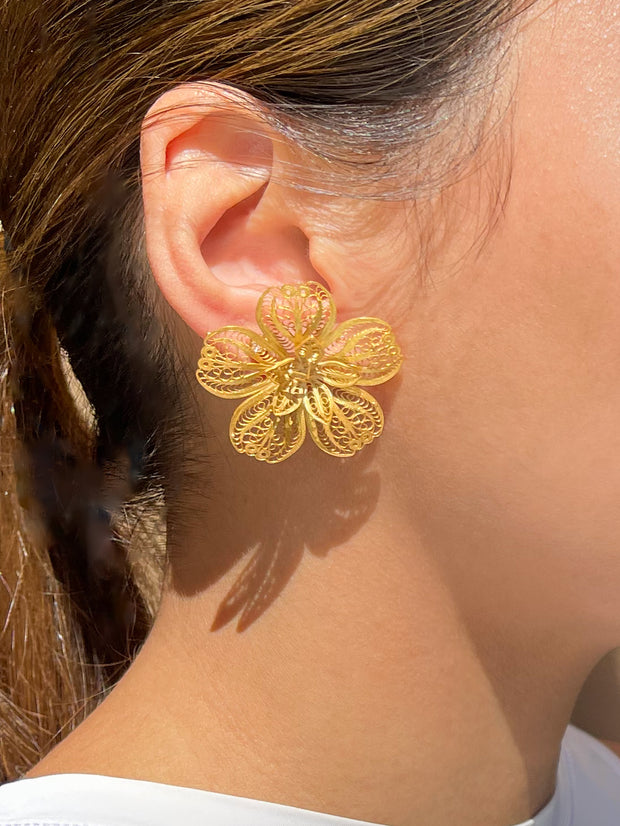 Filipino gold handmade earrings when worn