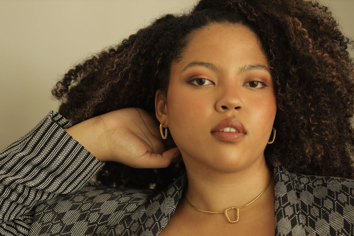 Pinatapatan Gold Drop Earrings Worn on Model
