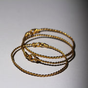 Gold Bangles Stacked