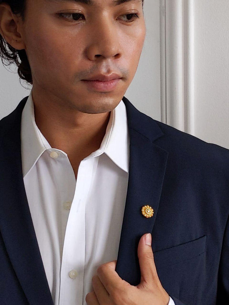 Bernie Filigree Lapel Pin Gold On Blue Suit