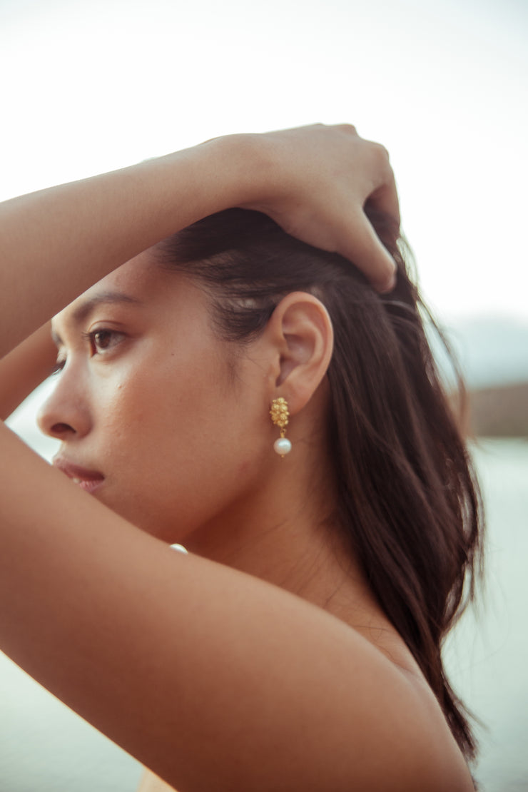 On model, Estela Rosita Pearl Drops Gold Earrings