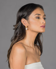 On model, Gold Estela Rosita Pearl Drop Earrings