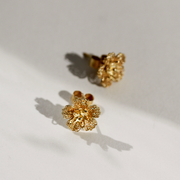 Gold Gumamela stud earrings