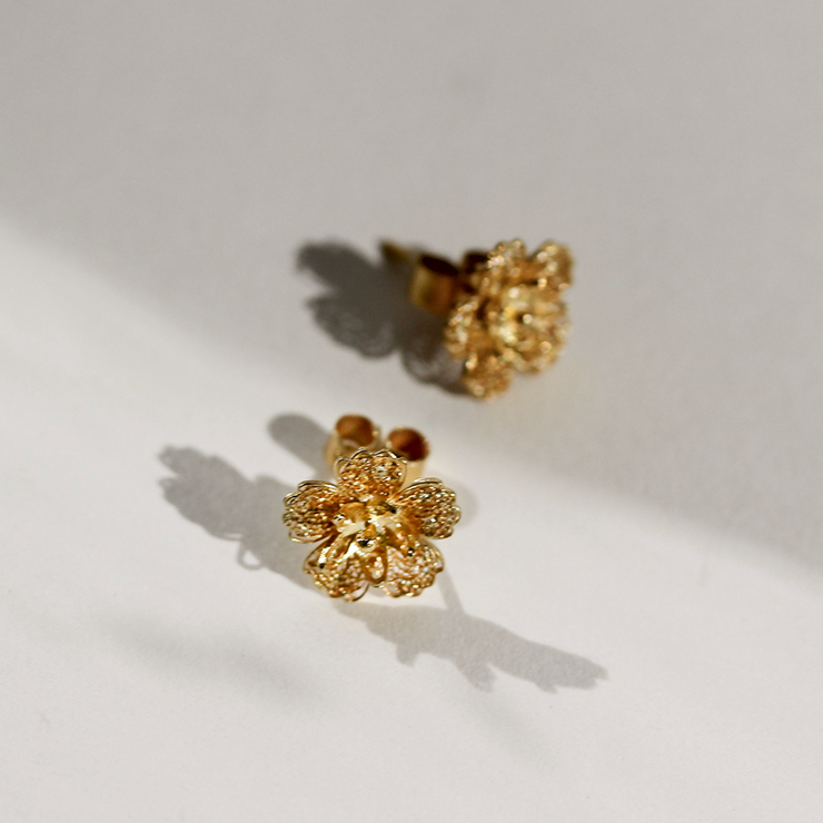 Gold Gumamela stud earrings