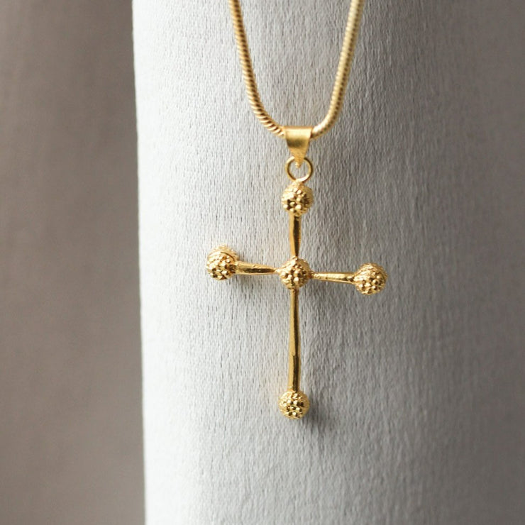 Gold cross pendant necklace